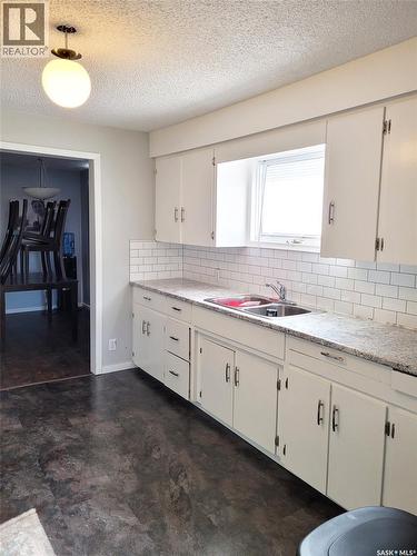 601 3Rd Avenue E, Meadow Lake, SK - Indoor Photo Showing Kitchen With Double Sink