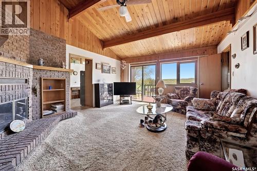 45 Miller Crescent E, Lumsden, SK - Indoor Photo Showing Living Room With Fireplace