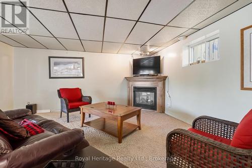 16 Fire Route 122, Trent Lakes, ON - Indoor Photo Showing Living Room With Fireplace