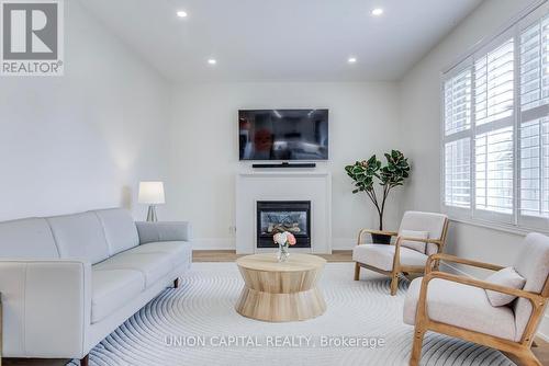 69 Southbrook Crescent, Markham, ON - Indoor Photo Showing Living Room With Fireplace