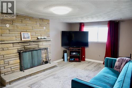 21 Deschene Avenue, Hamilton, ON - Indoor Photo Showing Living Room With Fireplace