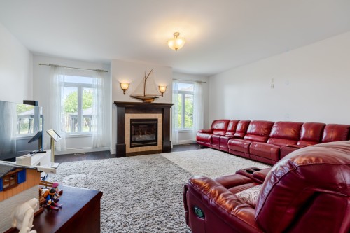 Salon - 7640 Av. De Lugano, Brossard, QC - Indoor Photo Showing Living Room With Fireplace