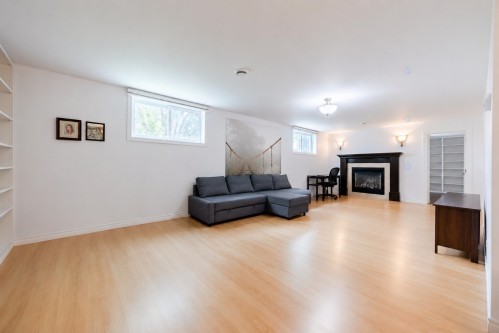 Salon - 7640 Av. De Lugano, Brossard, QC - Indoor With Fireplace
