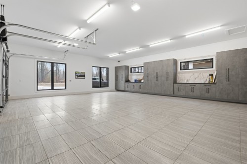 Garage - 168 Ch. Des Sables, L'Ange-Gardien, QC - Indoor Photo Showing Other Room