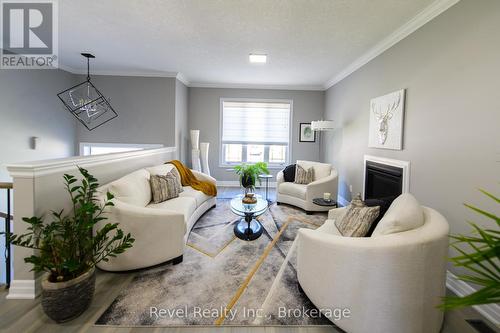 31 Natures Trail, Wasaga Beach, ON - Indoor Photo Showing Living Room With Fireplace