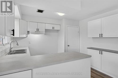 667 Skyline Road, Selwyn, ON - Indoor Photo Showing Kitchen With Double Sink