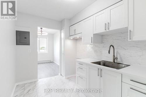 Quartz Counters - New Sink & Fixtures - 404 B - 2044 Arrowsmith Drive, Ottawa, ON - Indoor Photo Showing Kitchen