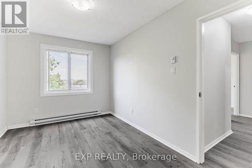 All new Baseboard Heaters - Thermostats! - 404 B - 2044 Arrowsmith Drive, Ottawa, ON - Indoor Photo Showing Other Room