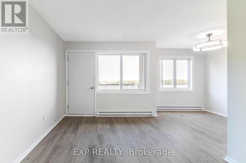 Balcony Entrance from the Living Room! - 404 B - 2044 Arrowsmith Drive, Ottawa, ON - Indoor Photo Showing Other Room