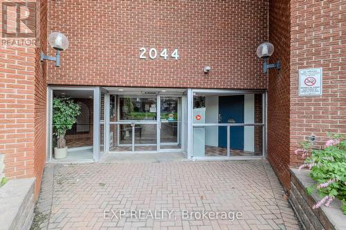 Bright & Welcoming Entrance - 404 B - 2044 Arrowsmith Drive, Ottawa, ON - Outdoor With Exterior