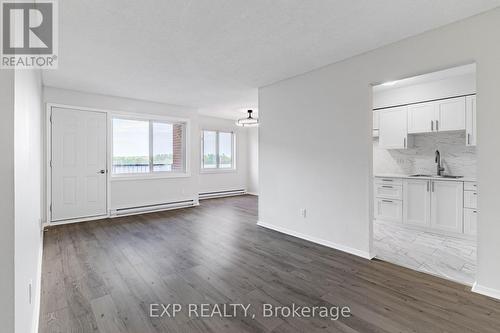 Bright & Open - All New Flooring - 404 B - 2044 Arrowsmith Drive, Ottawa, ON - Indoor Photo Showing Other Room
