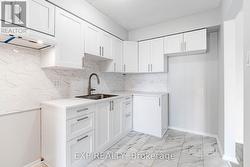 New -Cabinets - Floor - Fish Scale Tile Backslash - 
