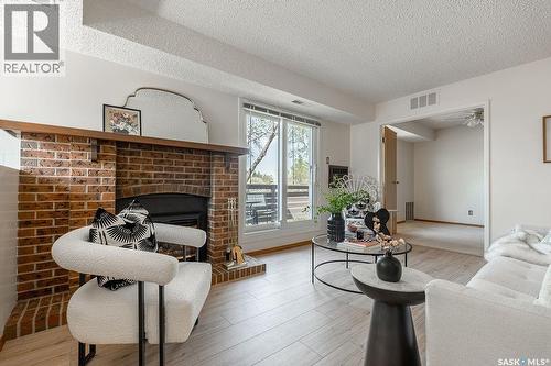507 603 Lenore Drive, Saskatoon, SK - Indoor Photo Showing Living Room With Fireplace