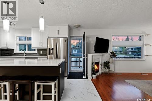 171 Coldspring Crescent, Saskatoon, SK - Indoor Photo Showing Kitchen With Fireplace With Stainless Steel Kitchen With Upgraded Kitchen
