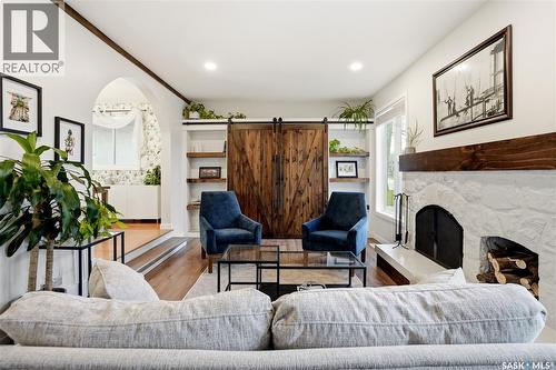 14 Edenwold Crescent, Regina, SK - Indoor Photo Showing Living Room With Fireplace