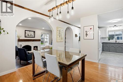 14 Edenwold Crescent, Regina, SK - Indoor Photo Showing Dining Room With Fireplace