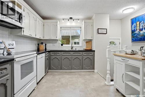 14 Edenwold Crescent, Regina, SK - Indoor Photo Showing Kitchen With Double Sink