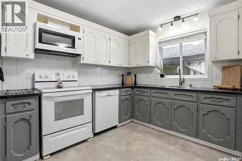 14 Edenwold Crescent, Regina, SK - Indoor Photo Showing Kitchen With Double Sink