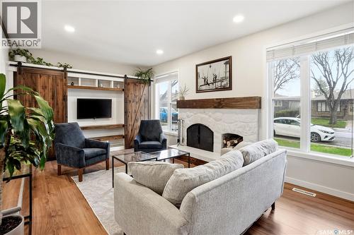 14 Edenwold Crescent, Regina, SK - Indoor Photo Showing Living Room With Fireplace