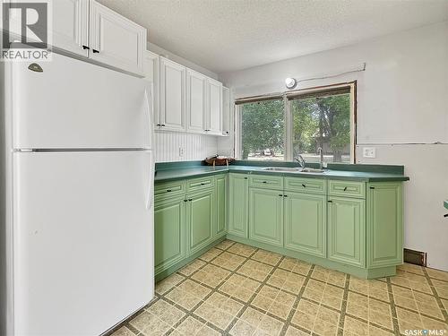 406 Wexford Street, Balcarres, SK - Indoor Photo Showing Kitchen With Double Sink