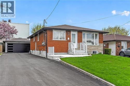 Brick exterior with a stone accent facade - 74 Victor Boulevard, Hamilton, ON - Outdoor
