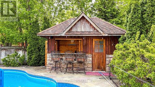 1206 Lindenrock Drive, Oakville, ON - Outdoor With In Ground Pool With Deck Patio Veranda