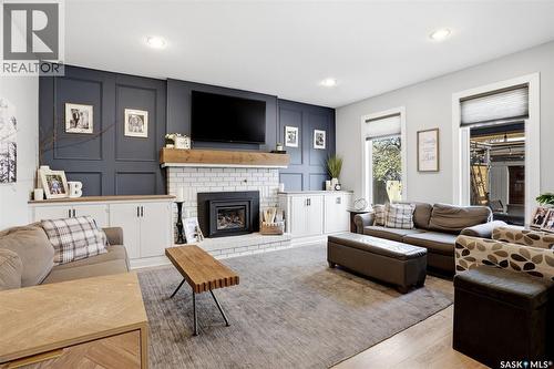10 Louise Crescent, Regina, SK - Indoor Photo Showing Living Room With Fireplace