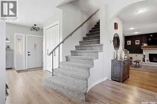 10 Louise Crescent, Regina, SK - Indoor Photo Showing Other Room With Fireplace
