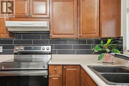 314 Waterbury Road, Saskatoon, SK - Indoor Photo Showing Kitchen With Double Sink