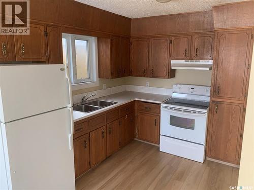 111 M Avenue S, Saskatoon, SK - Indoor Photo Showing Kitchen With Double Sink