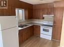 111 M Avenue S, Saskatoon, SK  - Indoor Photo Showing Kitchen With Double Sink 