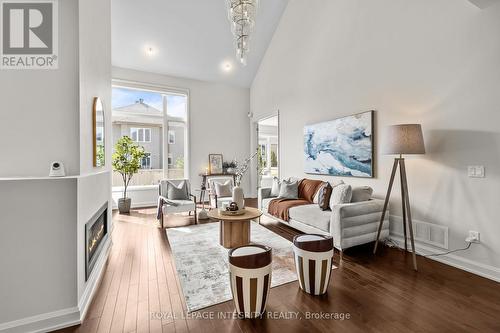 Bright Living room with 17 foot ceilings - 143 Stonemeadow Drive, Ottawa, ON - Indoor Photo Showing Living Room