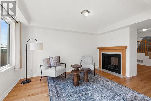 389 Rouncey Road, Ottawa, ON - Indoor Photo Showing Living Room With Fireplace