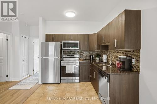 104 - 6045 Dunn Street, Niagara Falls (Dorchester), ON - Indoor Photo Showing Kitchen With Double Sink