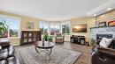 303-2420 Ingram Road, West Kelowna, BC  - Indoor Photo Showing Living Room With Fireplace 