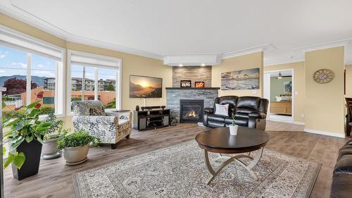 303-2420 Ingram Road, West Kelowna, BC - Indoor Photo Showing Living Room With Fireplace