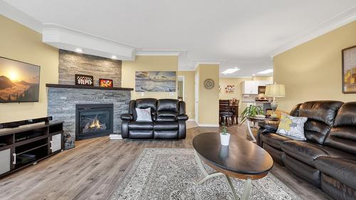 303-2420 Ingram Road, West Kelowna, BC - Indoor Photo Showing Living Room With Fireplace