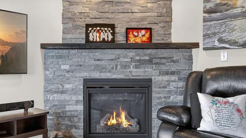 303-2420 Ingram Road, West Kelowna, BC - Indoor Photo Showing Living Room With Fireplace