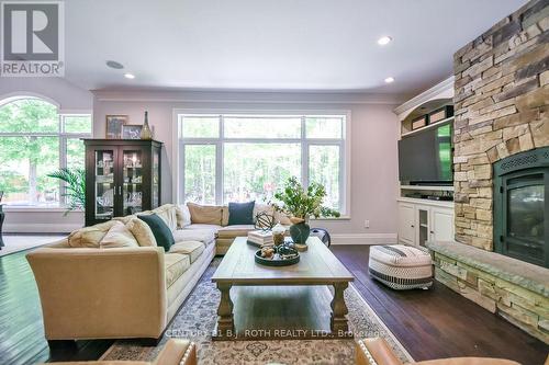 33 Reilly'S Run, Springwater, ON - Indoor Photo Showing Living Room With Fireplace