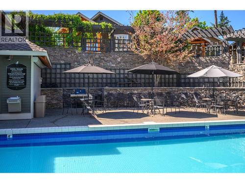 251 Predator Ridge Drive Unit# 42, Vernon, BC - Outdoor With In Ground Pool