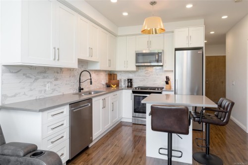 #105-745 Travino Lane, Saanich, BC - Indoor Photo Showing Kitchen With Stainless Steel Kitchen With Upgraded Kitchen