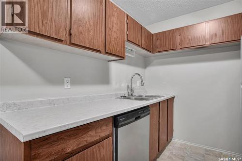 308 311 Tait Crescent, Saskatoon, SK - Indoor Photo Showing Kitchen With Double Sink