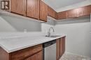 308 311 Tait Crescent, Saskatoon, SK  - Indoor Photo Showing Kitchen With Double Sink 