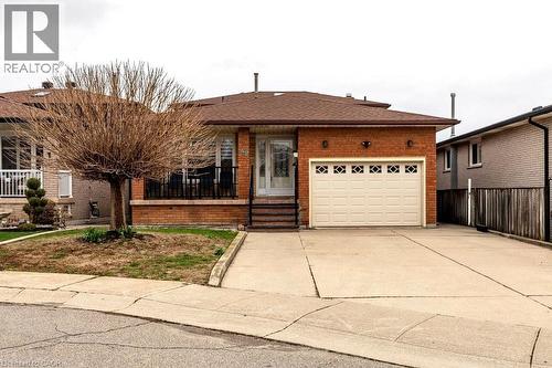 front with cement drive and 1 1/2 car garage - 42 Lasila Court, Hamilton, ON 