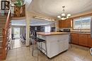 Large kitchen with moveable island - 42 Lasila Court, Hamilton, ON 