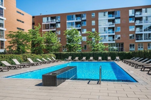 Front of Structure - Th123-210 Ch. Du Golf, Montréal (Verdun/Île-Des-Soeurs), QC - Outdoor With In Ground Pool With Balcony