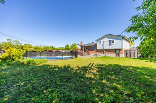 Courtyard - 14 Rue Dragon, Kirkland, QC - Outdoor With In Ground Pool With Deck Patio Veranda