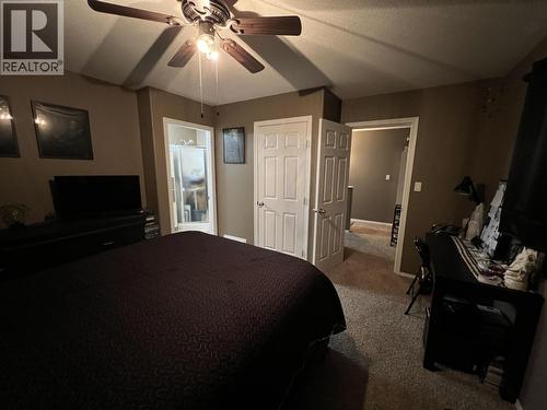 7 4620 E 52 Avenue, Fort Nelson, BC - Indoor Photo Showing Bedroom