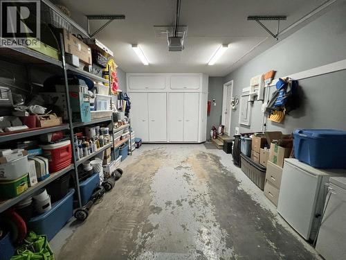 7 4620 E 52 Avenue, Fort Nelson, BC - Indoor Photo Showing Garage