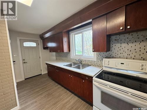 127 2Nd Avenue W, Biggar, SK - Indoor Photo Showing Kitchen With Double Sink